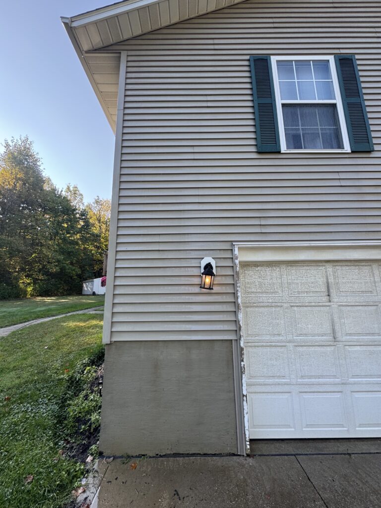 Clean vinyl siding after soft house washing by Wiley's Pressure Washing Service in Thompson OH.