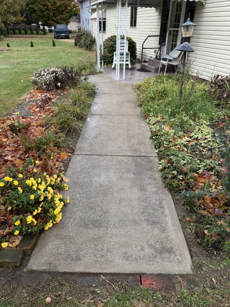 After Wiley's Pressure Washing Service cleaned this sidewalk in front of a home in Painesville OH