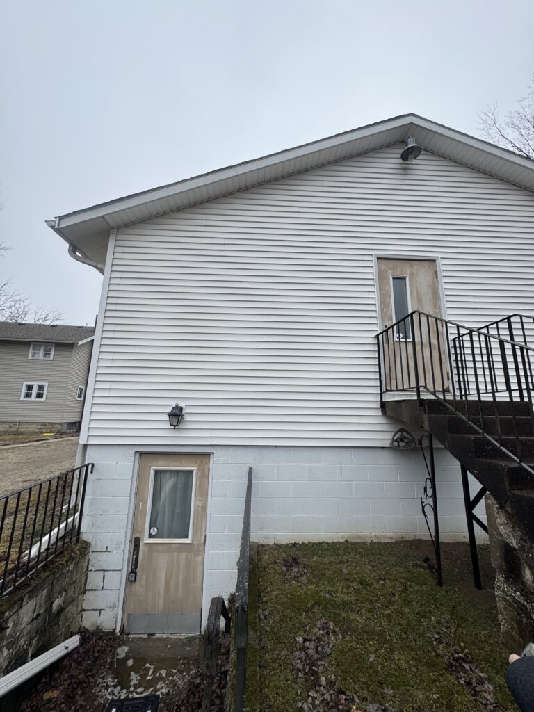 After Wiley's Pressure Washing Service cleaned this vinyl siding at a bridal shop in Geneva OH