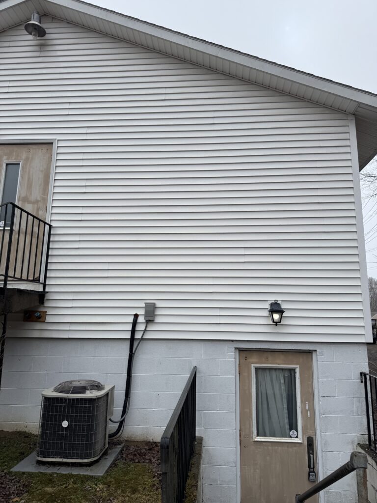 After Wiley's Pressure Washing Service cleaned this vinyl siding at a bridal shop in Geneva OH