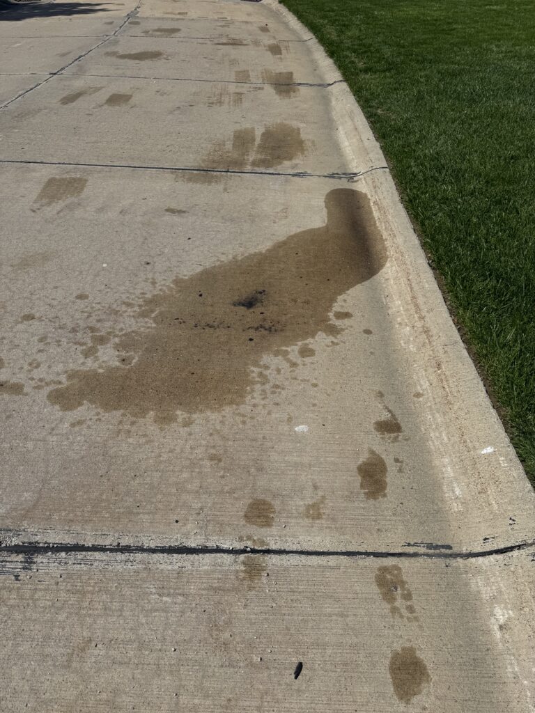 Concrete Cleaning Roadway before and after - by Wiley's pressure washing in Painesville, OH