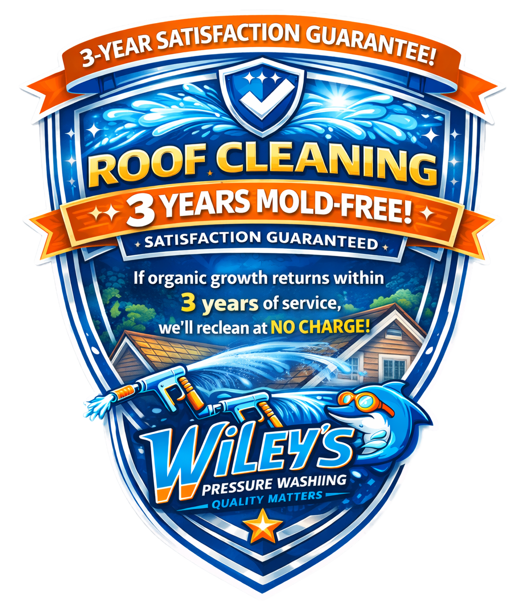 Promotional badge for wiley's pressure washing: roof cleaning, 3-year mold-free, satisfaction guaranteed.